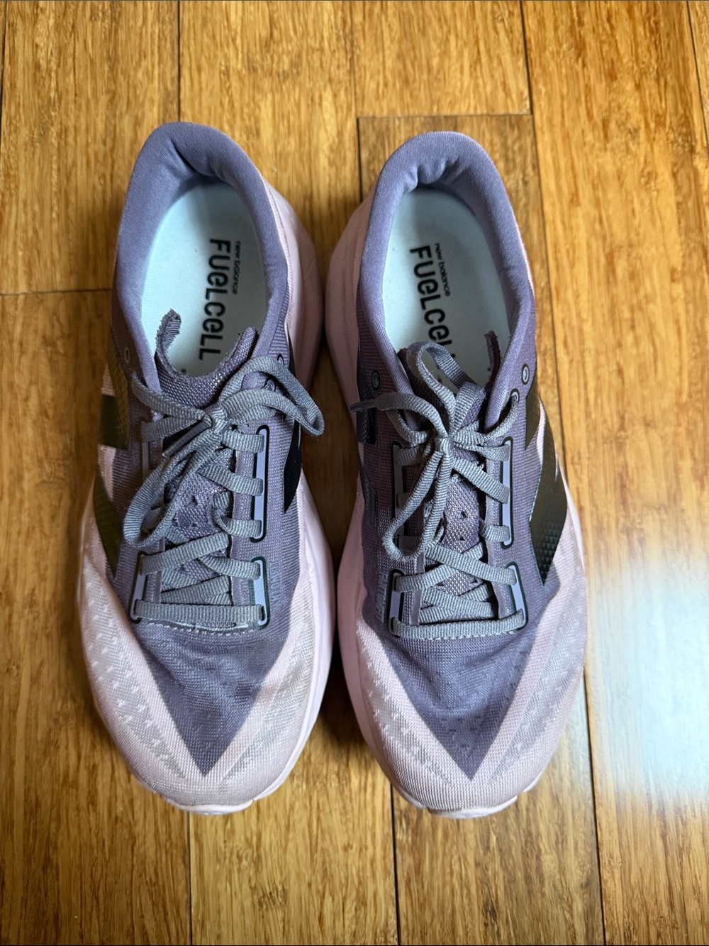 New Balance Women's Fuelcell Rebel V4 running shoe Twilight/Ice/Black size 10